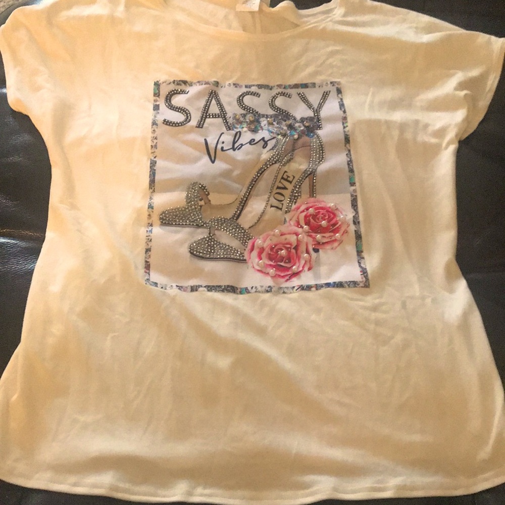 Size small white tee white rhinestones.